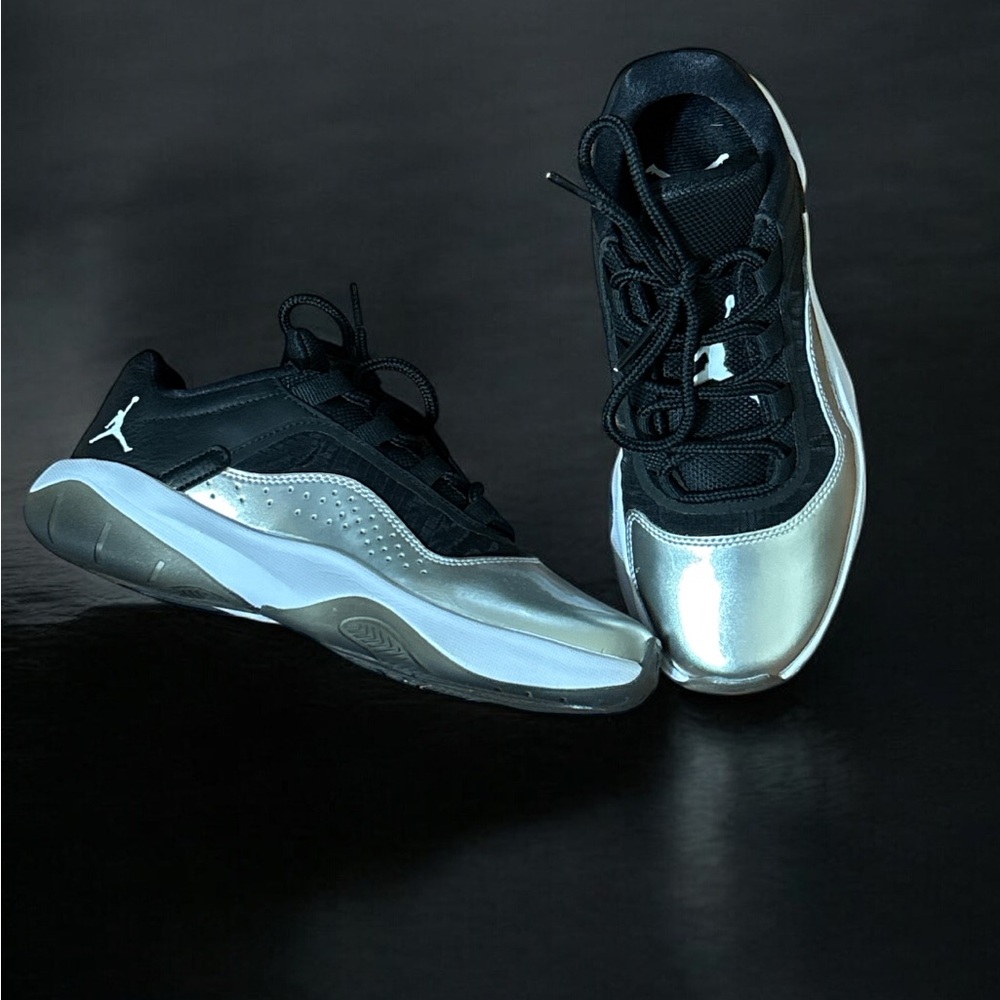 Women’s Black and Silver Air Jordan 11 CMFT LOW SNEAKERS